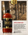 A bottle of Lillie's Bourbon Barrel Aged Smoky BBQ Sauce is featured prominently in the foreground against a rustic background of wooden barrels, with text on the right describing the limited edition release.