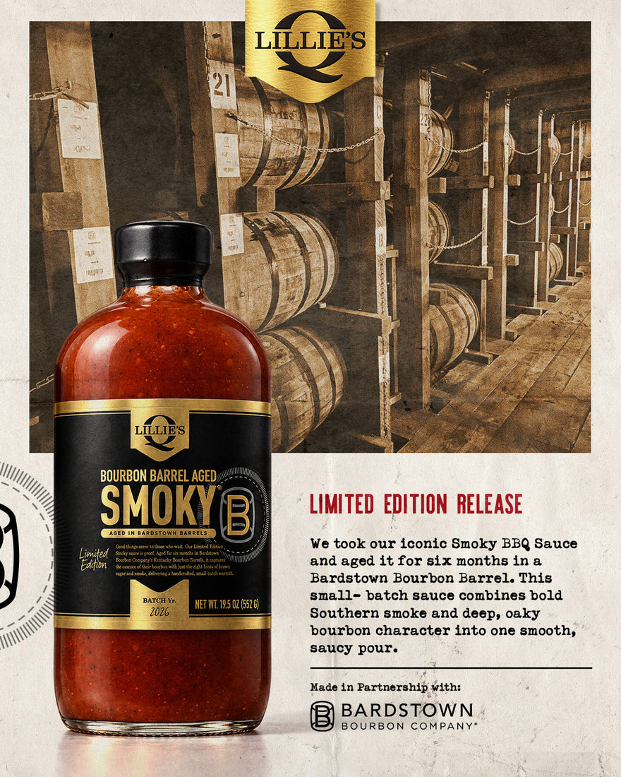 A bottle of Lillie's Bourbon Barrel Aged Smoky BBQ Sauce is featured prominently in the foreground against a rustic background of wooden barrels, with text on the right describing the limited edition release.